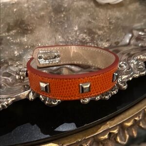 Vibrant Orange and Silver Watch with Bold Design